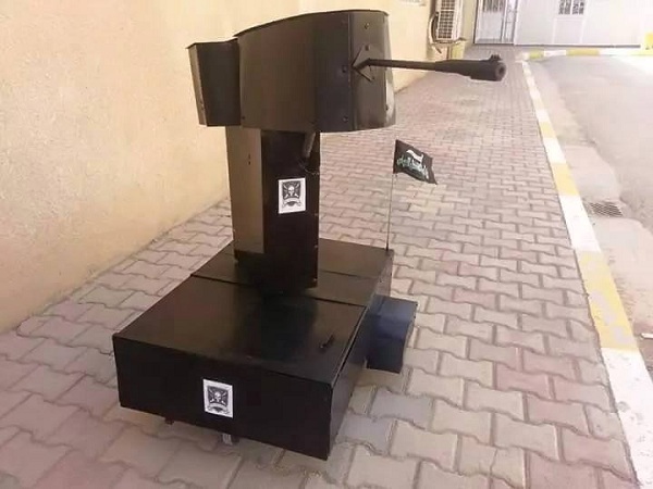 طلاب مهرة في جامعة كربلاء يصنعون روبوت عسكري